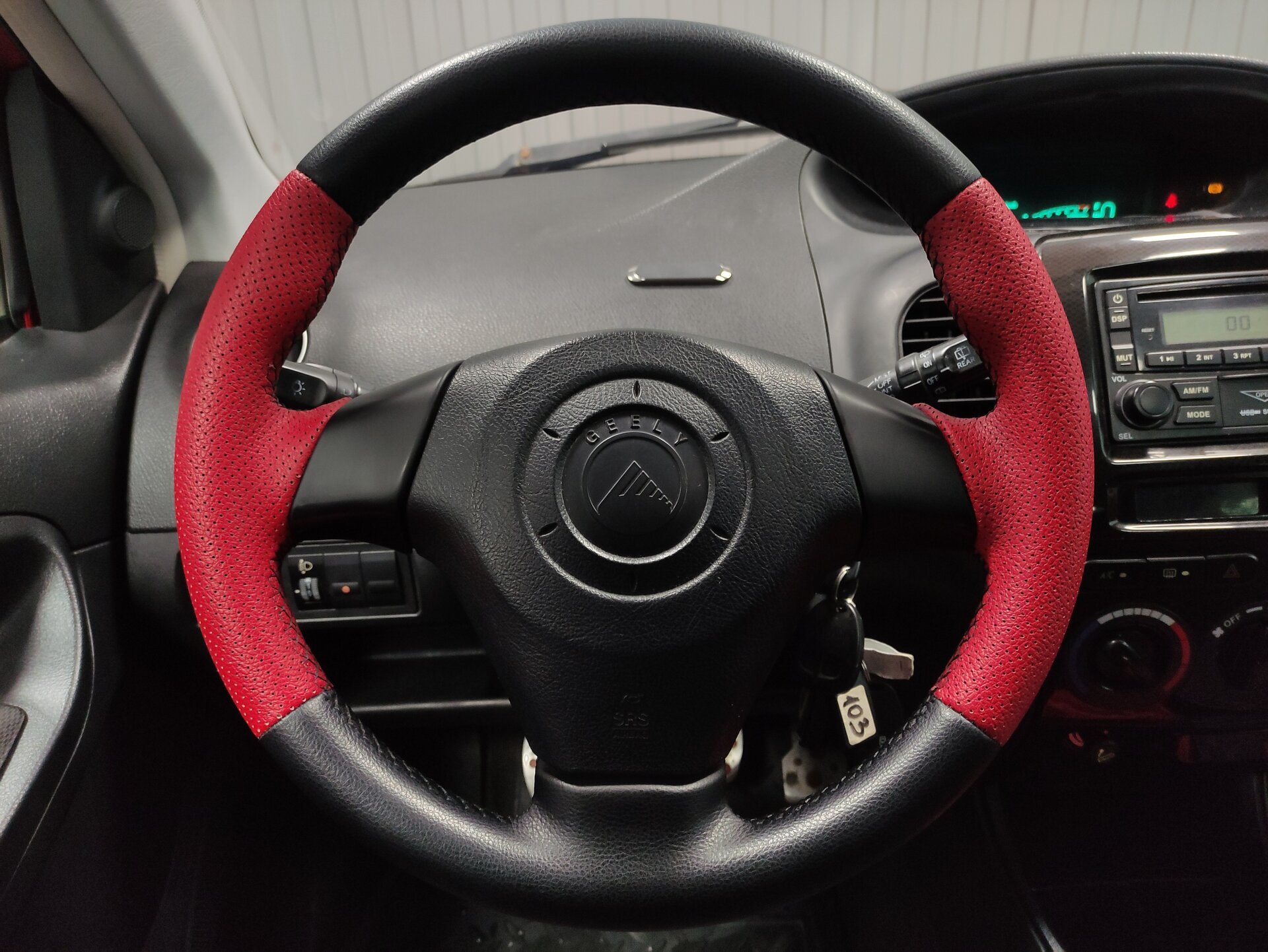 Geely MK Cross, I 2012